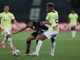 Botafogo's Tiquinho Soares in action with LDU Quito's Oscar Zambrano on May 4, 2023