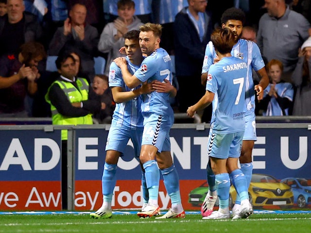 Coventry City's Yasin Ayari celebrates scoring their first goal with teammates on September 25, 2023
