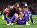 Crystal Palace's Dean Henderson receives medical attention after sustaining an injury on September 26, 2023