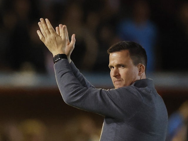 Exeter City manager Gary Caldwell celebrates after the match on September 26, 2023