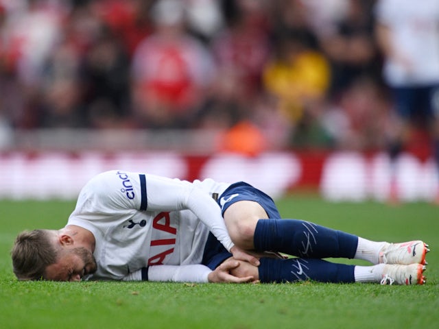 Tottenham Hotspur's James Maddison goes down injured on September 24, 2023