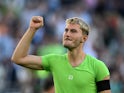 Wolfsburg's Jonas Wind celebrates after the match on September 16, 2023
