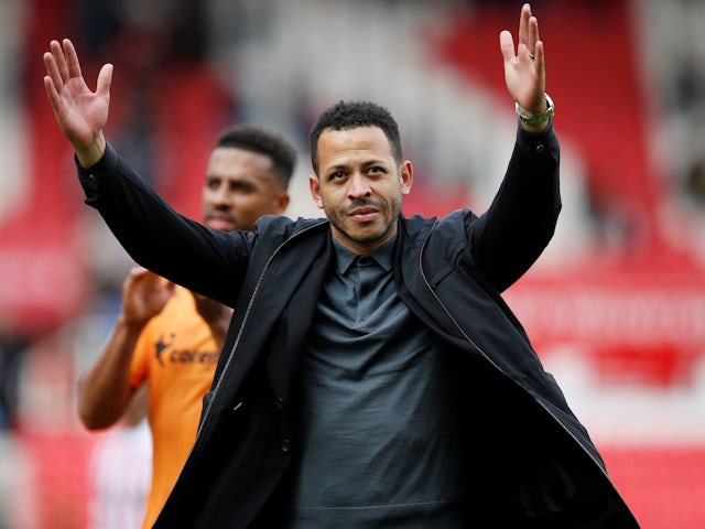 Hull City manager Liam Rosenior applauds the fans after the match on September 24, 2023