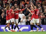 Manchester United's Anthony Martial celebrates scoring their third goal with teammates on September 26, 2023