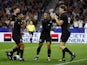 New Zealand's Aaron Smith celebrates scoring their sixth try with teammates on September 29, 2023