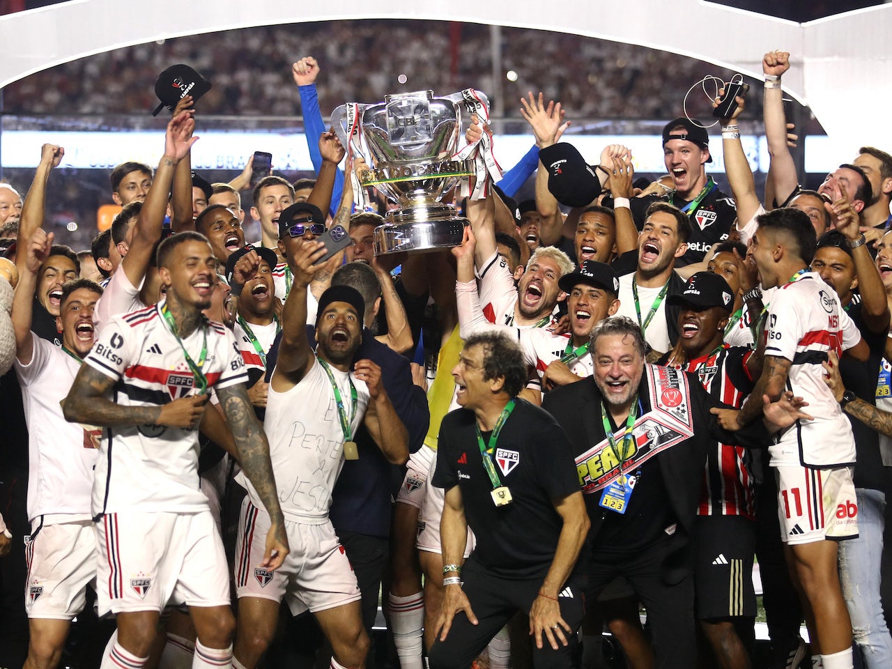 Sao Paulo players celebrate winning the Copa Do Brasil final with the