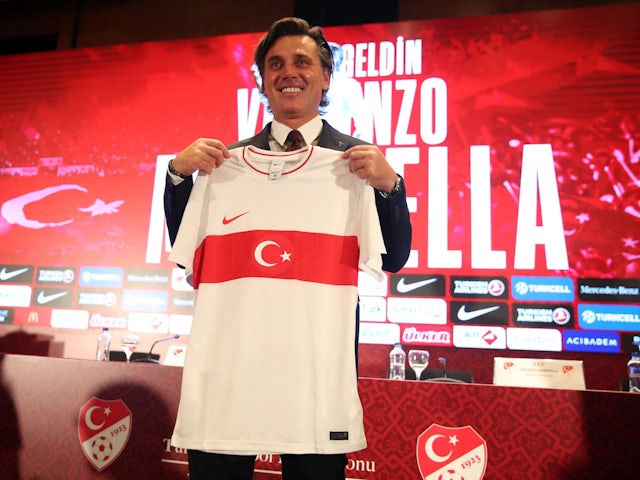 New Turkey coach Vincenzo Montella poses with a national team shirt after being unveiled on September 27, 2023