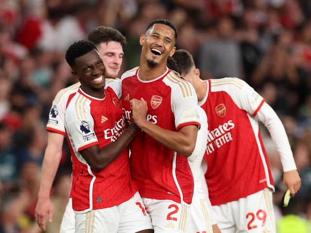 Arsenal's Eddie Nketiah and William Saliba celebrate after the match on October 8, 2023