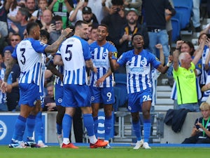 Dunk snatches point for Brighton in four-goal Liverpool thriller