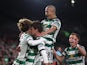Celtic's Kyogo Furuhashi celebrates scoring their first goal with teammates Matt O'Riley and Daizen Maeda on October 4, 2023