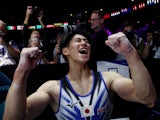 Japan's Daiki Hashimoto celebrates winning the men's individual all-around final on October 5, 2023