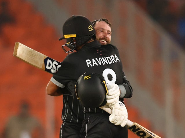 Devon Conway and Rachin Ravindra celebrate for New Zealand and England on October 5, 2023.