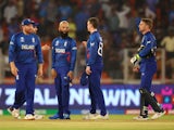 England's Jonny Bairstow, Jos Buttler and Moeen Ali look dejected after the match on October 5, 2023
