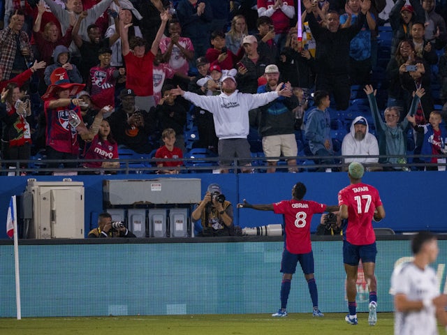 FC Dallas forward Jader Obrian (8) and forward Alan Velasco (20) and the FC Dallas fans celebrate on October 8, 2023