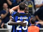 Inter Milan's Marcus Thuram celebrates scoring their first goal with teammate Benjamin Pavard on October 3, 2023