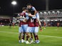 Burnley's Lyle Foster celebrates scoring their first goal with teammates on October 3, 2023
