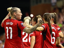 Manchester United Women's Leah Galton celebrates scoring their first goal with teammates on October 6, 2023