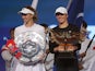 Poland's Iga Swiatek and Russia's Liudmila Samsonova pose with the trophies after the Women's Singles final match on October 8, 2023