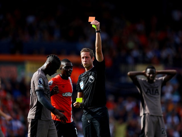Tottenham Hotspur's Yves Bissouma is shown a red card by referee John Brooks on October 7, 2023