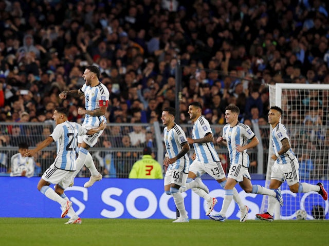 Argentina's Nicolas Otamendi celebrates scoring their first goal with teammates on October 13, 2023