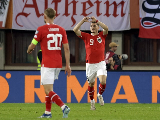 Austria's Marcel Sabitzer celebrates scoring their second goal on October 13, 2023