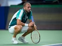 Dan Evans reacts at the Shanghai Masters on October 9, 2023