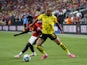 Borussia Dortmund forward Donyell Malen in action with Manchester United midfielder Omari Forson on July 30, 2023