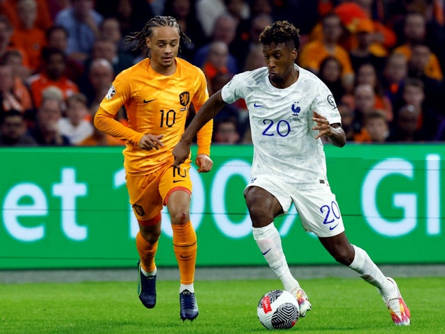 France's Kingsley Coman in action with Netherlands' Xavi Simons on October 13, 2023
