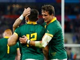 South Africa's Damian de Allende celebrates scoring their second try on October 15, 2023