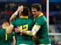 South Africa's Damian de Allende celebrates scoring their second try on October 15, 2023