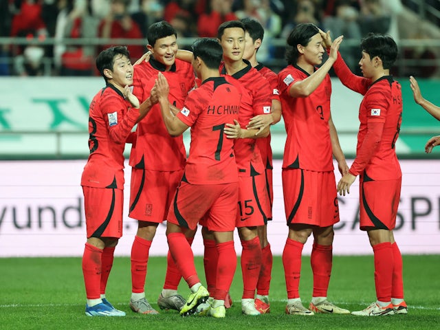 South Korea players celebrate their third goal on October 13, 2023