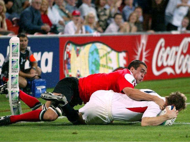 England's Will Greenwood scores a try against Wales in November 2003