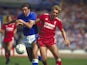 Everton's Graeme Sharp and Liverpool's Barry Venison in action in 1986