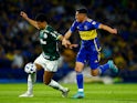 Palmeiras' Murilo Cerqueira in action with Boca Juniors' Ezequiel Fernandez on September 28, 2023