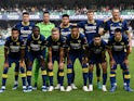 Hellas Verona players pose for a team group photo before the match on October 21, 2023
