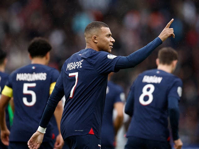 Paris Saint Germain's Kylian Mbappe celebrates scoring their first goal on October 21, 2023