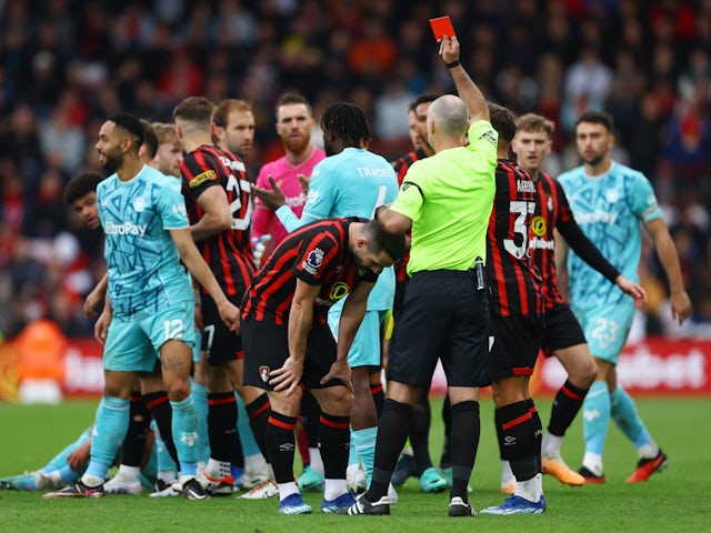 Bournemouth's Lewis Cook is shown a red card by referee Paul Tierney on October 21, 2023
