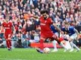 Liverpool's Mohamed Salah scores their first goal on October 21, 2023