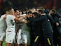 Montenegro's Stevan Jovetic celebrates scoring their first goal with teammates on October 17, 2023