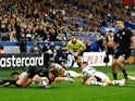 New Zealand's Jordie Barrett scores their second try on October 20, 2023