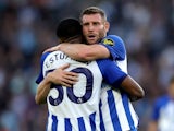 Brighton & Hove Albion's Pervis Estupinan and James Milner celebrate after the match on September 2, 2023