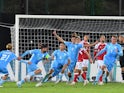 San Marino's Alessandro Golinucci celebrates scoring their first goal with teammates on October 17, 2023