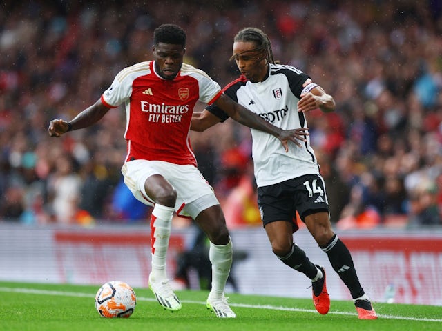 Fulham's Bobby Decordova-Reid in action with Arsenal's Thomas Partey on August 26, 2023