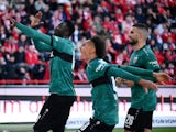 VfB Stuttgart's Silas Katompa Mvumpa celebrates scoring their second goal with teammates on October 21, 2023