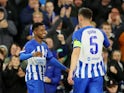 Brighton & Hove Albion's Ansu Fati celebrates scoring their second goal with teammate Lewis Dunk on October 26, 2023