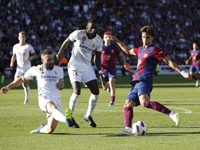 Barcelona's Joao Felix in action with Real Madrid's Dani Carvajal on October 28, 2023