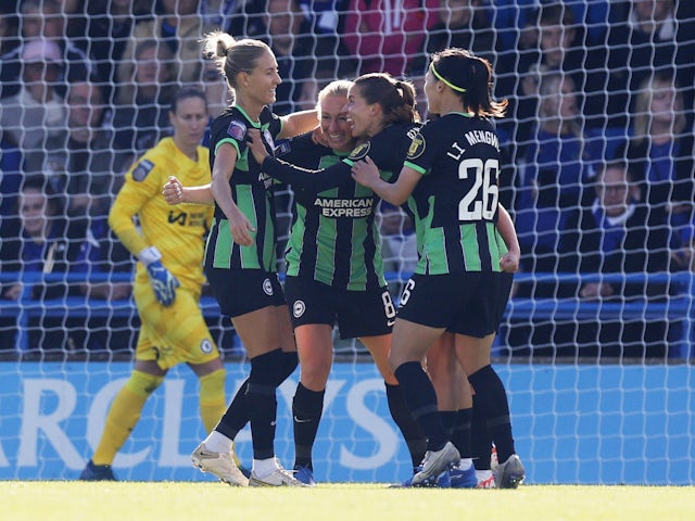 Brighton & Hove Albion Women's Pauline Bremer celebrates scoring their first goal with teammates on October 22, 2023