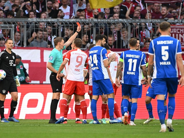 Bayern Munich's Joshua Kimmich is shown a red card by referee Martin Petersen on October 28, 2023