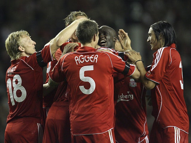 Liverpool players celebrate scoring against Toulouse in 2007
