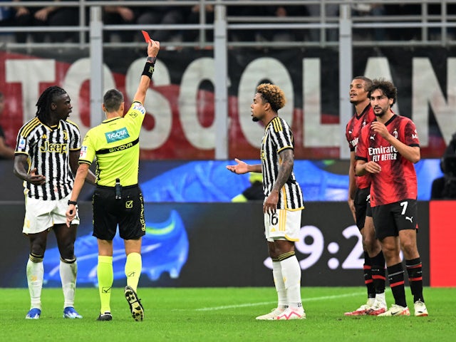 AC Milan's Malick Thiaw is shown a red card by referee Maurizio Mariani on October 22, 2023